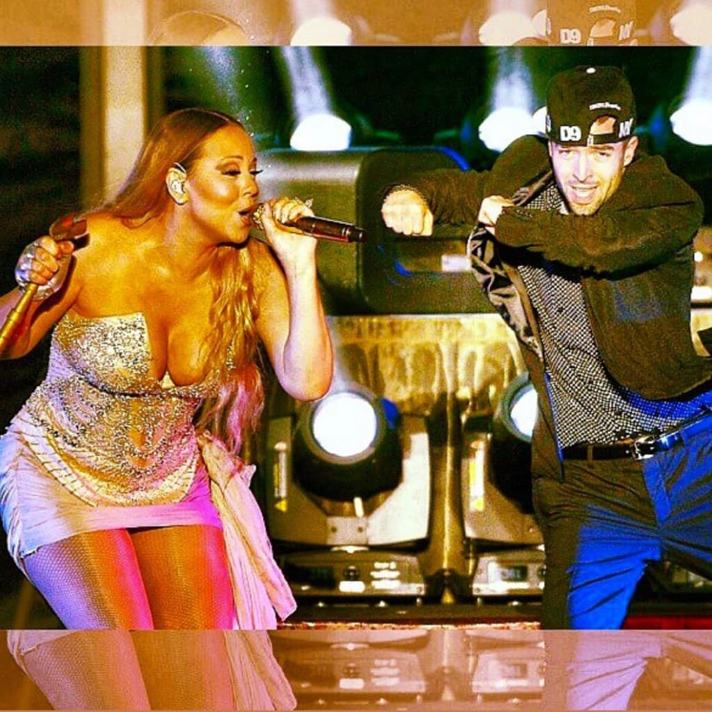 James Marino performing with Mariah Carey